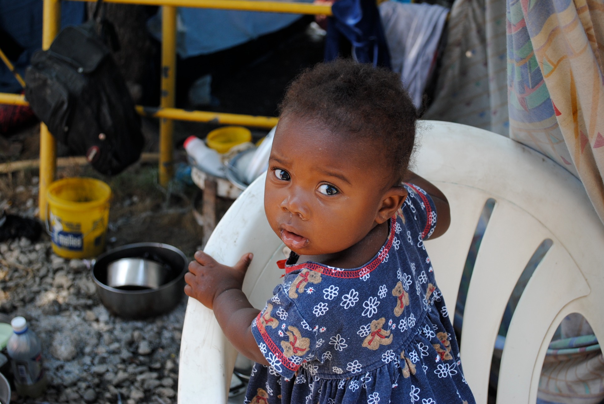 Young child from a beneficiary community served through IMI's Haiti earthquake relief efforts